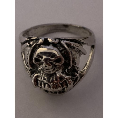 513 - A WHITE METAL SKULL RING