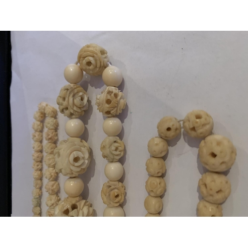 519 - ANTIQUE IVORY COLOURED CARVED ROSE BEADS NECKLACE, SINGLE GRADUATED STRAND 40 INCHES TOGETHER WITH T... 