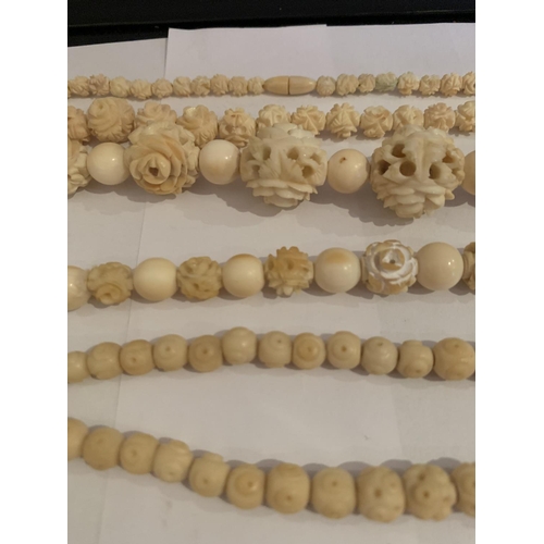 519 - ANTIQUE IVORY COLOURED CARVED ROSE BEADS NECKLACE, SINGLE GRADUATED STRAND 40 INCHES TOGETHER WITH T... 