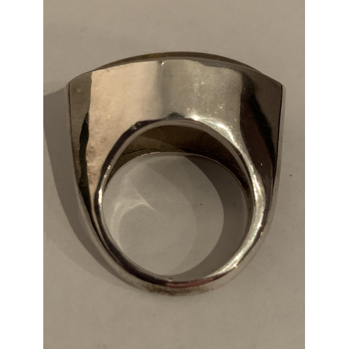 526 - A BOXED WHITE METAL RING WITH STONE