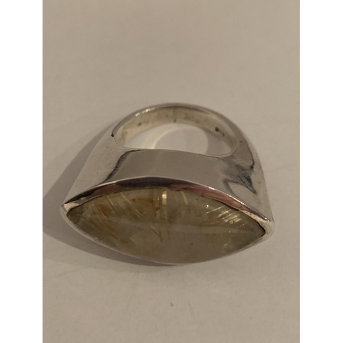 526 - A BOXED WHITE METAL RING WITH STONE