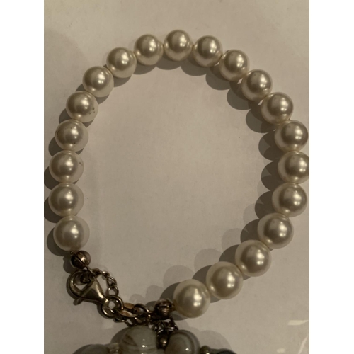 529 - FOUR SILVER CLASP BRACELETS