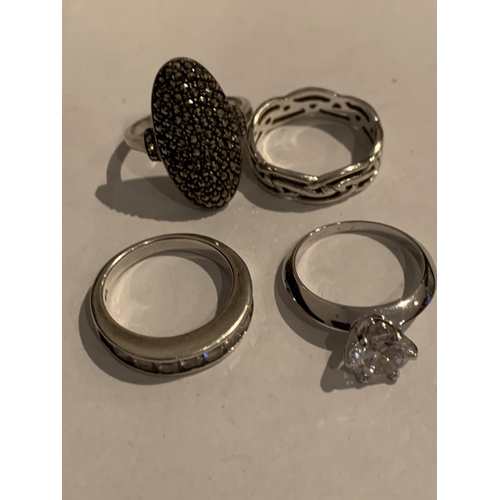 531 - FOUR VARIOUS SILVER RINGS