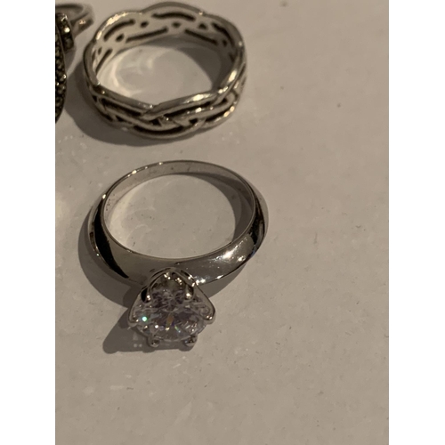 531 - FOUR VARIOUS SILVER RINGS