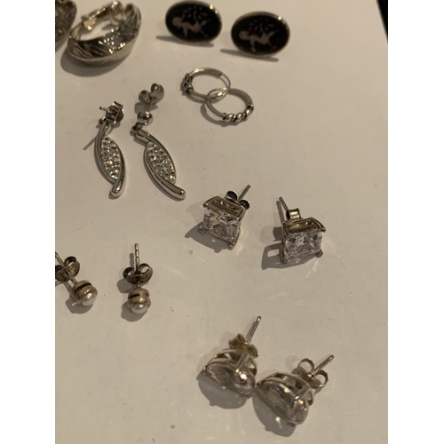 550 - TWELVE PAIRS OF SILVER EARRINGS TO INCLUDE DROPS, STUDS, RINGS ETC