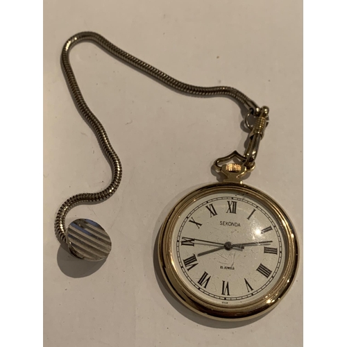 553 - A GOLD PLATED POCKET WATCH AND CHAIN IN WORKING ORDER