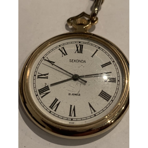 553 - A GOLD PLATED POCKET WATCH AND CHAIN IN WORKING ORDER