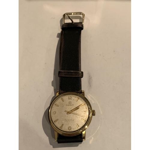 561 - A TISSOT AUTOMATIC SEASTAR WRIST WATCH IN WORKING ORDER