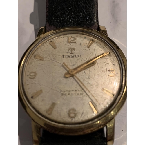 561 - A TISSOT AUTOMATIC SEASTAR WRIST WATCH IN WORKING ORDER