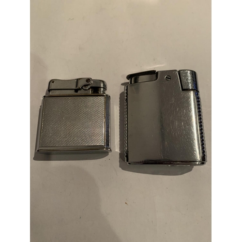 566 - TWO WHITE METAL LIGHTERS