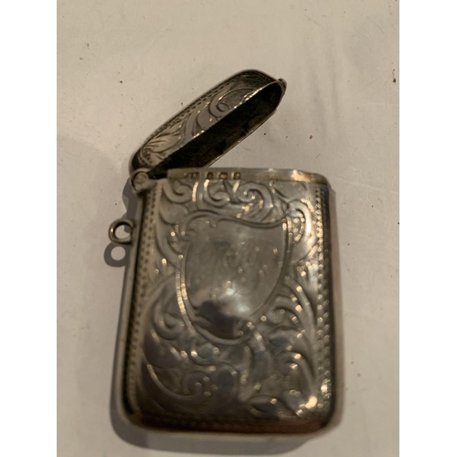 574 - A HALLMARKED BIRMINGHAM SILVER VESTA CASE