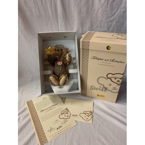 329 - A STEIFF TEDDY BEAR WITH ROLOPLAN BOXED WITH CERTIFICATE