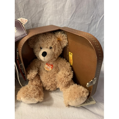 350 - TWO STEIFF BEAR SUITCASES CONTAINING LOTTE AND FYNN