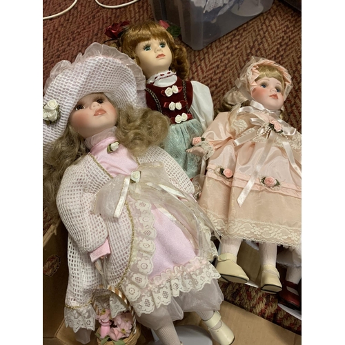 378 - A GROUP OF FIVE ASSORTED PORCELAIN HEADED DOLLS