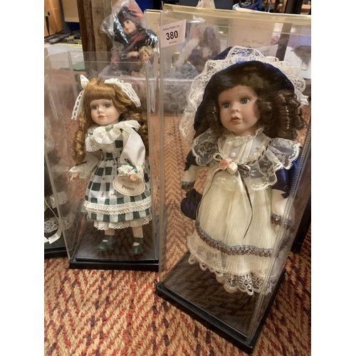 380 - FIVE PORCELAIN HEADED DOLLS