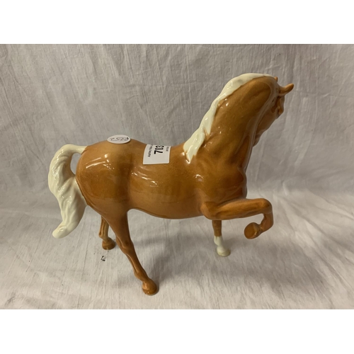 703 - A BESWICK PALOMINO PONY