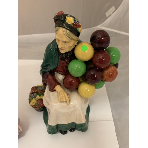 726 - A ROYAL DOULTON OLD BALLON SELLER AND A ROYAL DOULTON DINKY DO FIGURINE