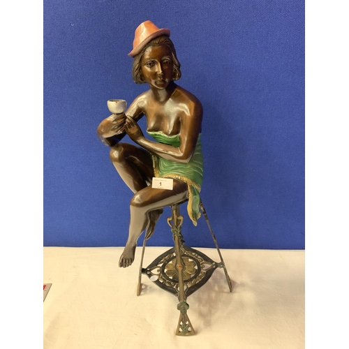 1 - A BRONZE FIGURINE OF A SEMI-NUDE POSED ON A TALL STOOL IN AN ART DECO STYLE