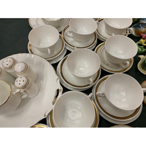 100 - AN ASSORTMENT OF WHITE DINNER WARE WITH GOLD DETAIL