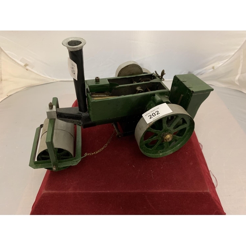 202 - A VINTAGE SELFRIDGES LTD MODEL STEAM ROLLER  WITH MINI FUNNEL, JUG AND INSTRUCTION SHEET - MODEL IS ... 