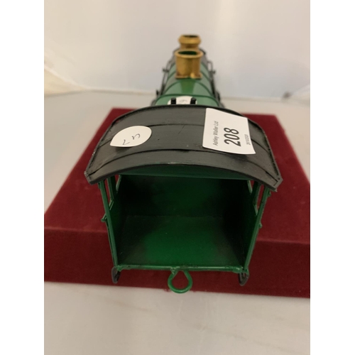 208 - A TINPLATE GREEN MODEL OF A 'GREAT WESTERN RAILWAY' TRAIN