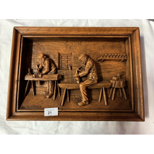 21 - A SIGNED WOODEN CARVED PICTURE DEPICTING CARPENTERS AT WORK