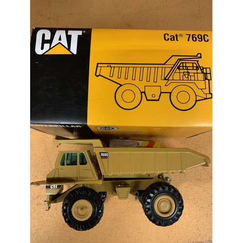 225 - A CATERPILLAR ARTIC DUMPTRUCK