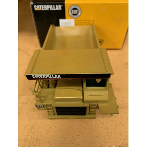 225 - A CATERPILLAR ARTIC DUMPTRUCK