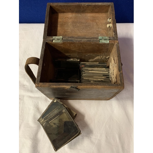 35 - A VINTAGE WOODEN BOX CONTAINING VICTORIAN GLASS SLIDES