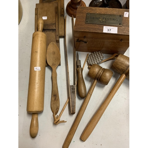 37 - A LARGE QUANTITY OF WOODEN ITEMS TO INCLUDE SEVERAL CANDLESTICKS