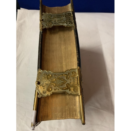 4 - A LARGE LEATHER AND BRASS BOUND HOLY BIBLE WITH AN 1876 BIRTH CERTIFICATE