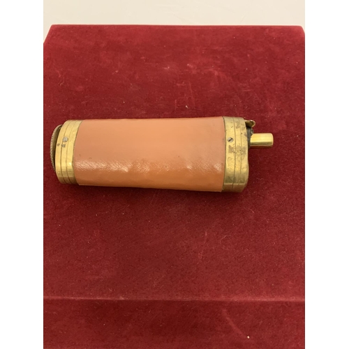 59 - A BRASS AND LEATHER THREE WAY POWDER FLASK