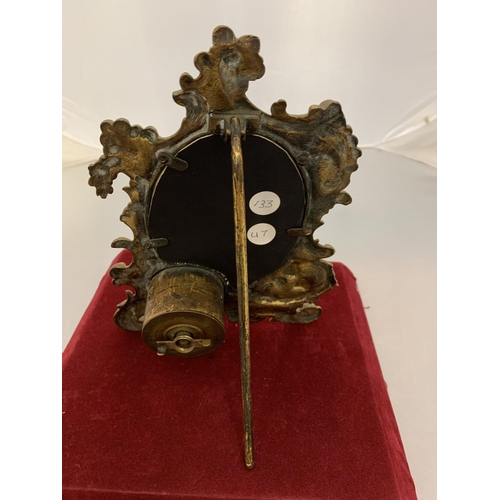 61 - A BRASS ART NOUVEAU MANTLE CLOCK