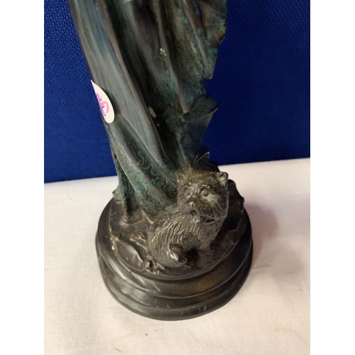 7 - AN SPELTER EDWARDIAN STYLE FIGURINE OF A LADY AND HER DOG