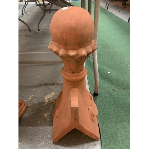 92 - A TERRACOTTA ROOF FINIAL IN A CHESS PIECE STYLE