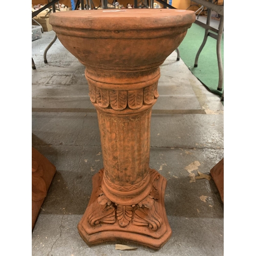 93 - AN ORNATE TERRACOTTA PEDESTAL