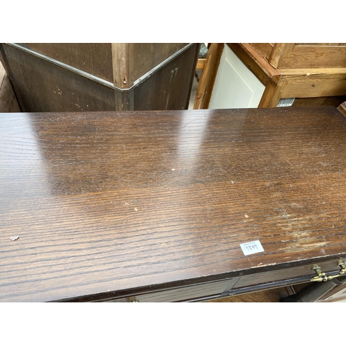 1849 - A REPRODUCTION OAK SIDE TABLE WITH TWO DRAWERS AND POT BOARD, 37