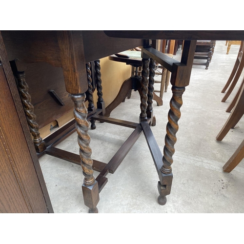 1854 - A MID 20TH CENTURY OAK GATELEG DINING TABLE ON BARLEYTWIST LEGS