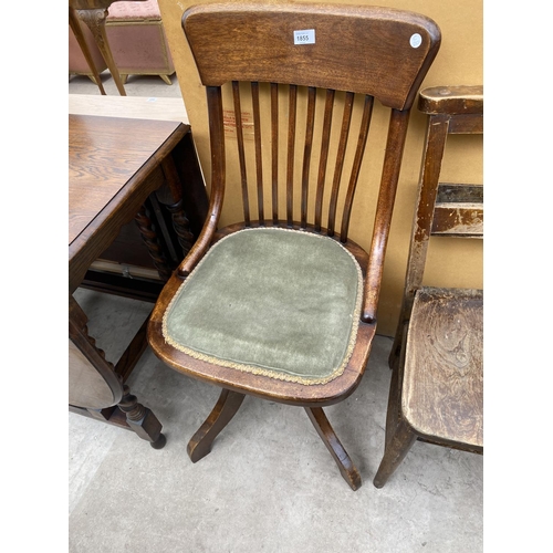 1855 - AN EARLY 20TH CENTURY BEECH SWIVEL OFFICE CHAIR AND CHAPEL CHAIR