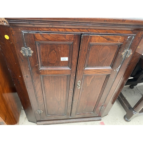 1875 - AN 18TH CENTURY OAK CORNER CUPBOARD WITH TWO PANELLED DOORS, 31