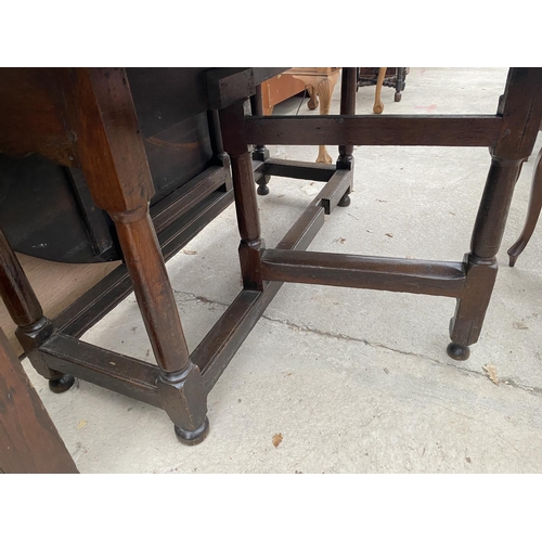 1876 - AN 18TH CENTURY AND LATER OAK GATELEG DINING TABLE