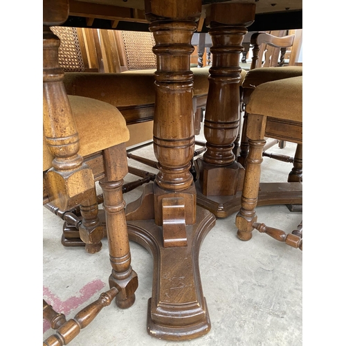 1883 - A CONTINENTAL STYLE EXTENDING DINING TABLE AND SIX DINING CHAIRS WITH CANE BACKS (4+2)