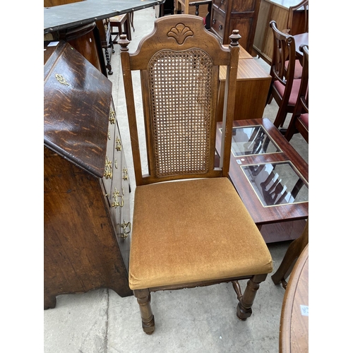 1883 - A CONTINENTAL STYLE EXTENDING DINING TABLE AND SIX DINING CHAIRS WITH CANE BACKS (4+2)