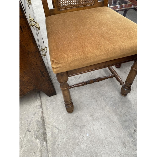 1883 - A CONTINENTAL STYLE EXTENDING DINING TABLE AND SIX DINING CHAIRS WITH CANE BACKS (4+2)