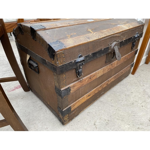 1887 - A VICTORIAN TWO HANDLED TRAVELLING TRUNK WITH DOMED TOP, 27