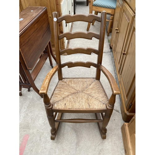 1894 - A SMALL WALNUT SEWING BOX ON CABRIOLE LEGS AND A RUSH SEATED CHILDS ROCKER