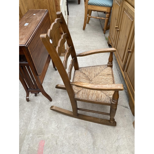 1894 - A SMALL WALNUT SEWING BOX ON CABRIOLE LEGS AND A RUSH SEATED CHILDS ROCKER