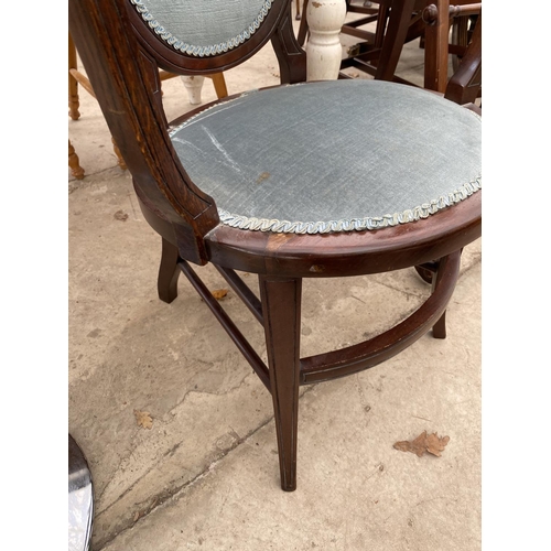 1911 - AN EDWARDIAN MAHOGANY LOW ELBOW CHAIR