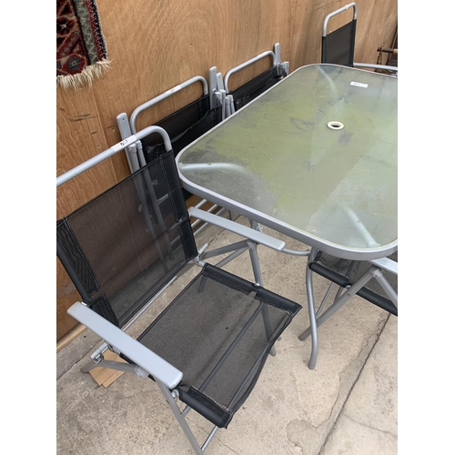 1232 - A GLASS TOPPED GARDEN TABLE WITH SIX DINING CHAIRS