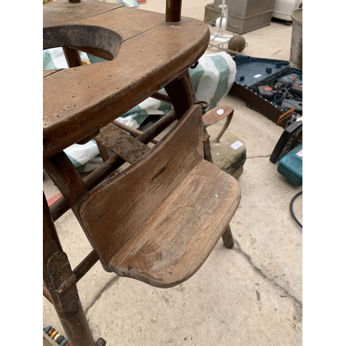 1277 - A VINTAGE WOODEN CHILD'S HIGH CHAIR  WITH MECHANICAL ADJUSTMENT